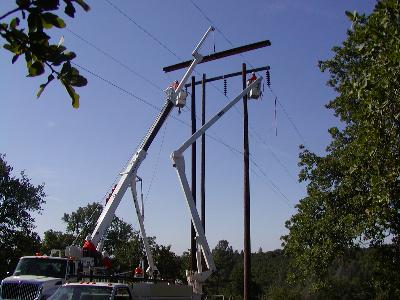 People Working on Power Lines